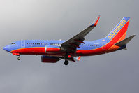 N211WN @ LAS - Southwest Airlines N211WN (FLT SWA2378) from Orange County-Santa Ana John Wayne Airport (KSNA) on short final to RWY 25L.