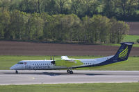 HB-JIK @ LOWW - Sky Work DHC 8 - by Thomas Ranner