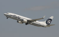 N524AS @ KLAX - Departing LAX on 25R - by Todd Royer