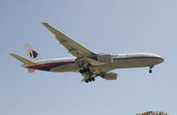 9M-MRI @ KLAX - Arriving at LAX on 24R - by Todd Royer