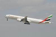 A6-ECF @ KLAX - Departing LAX on 25R - by Todd Royer