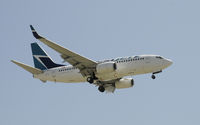 C-GWJK @ KLAX - Arriving at LAX on 24R - by Todd Royer