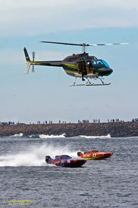 VH-MXW - A busy helicopter in the lower Hunter Valley, following all kinds of events: here above The Offshore Powerboat Championships, Newcastle Harbour - by stephenb49