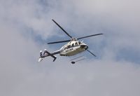N470WM @ KAPF - Shortly after lifting off from Naples Municipal - by Bill Pahl