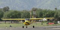 N50673 @ POC - Stopped on Cocco awaiting Ground Control permission to enter taxiway Sierra - by Helicopterfriend