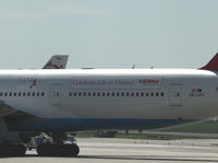 OE-LPC @ LOWW - Austrian Airlines Boeing 777 with Life Ball Sticker.