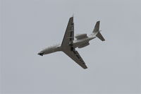 N537XJ @ KPSP - XOJET Bombardier BD-100-1A10, N537XL arriving from Van Nuys, RWY 31L approach at KPSP. - by Mark Kalfas
