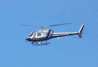 N996PD - Circling the Contra Costa Canal (CA) which has had drownings in the past. This is a long way away taken with the maximum telephoto setting. - by Bill Larkins