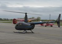 N442SH @ KAXN - Robinson R44 Raven departing the ramp. - by Kreg Anderson