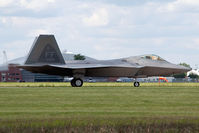 08-4166 @ LFI - 2010 Block 35 F-22A Raptor 08-4166 with the 94th FS Spads taxiing to the ramp after landing on RWY 26.