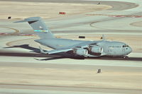 07-7176 @ KLAS - Globemaster III from 436thAW at Dover AFB, was part of the presidential support group while the President was in Las Vegas this day. Globemaster 07-7176 is seen departing RWY 19L on it's trip back east. - by Mark Kalfas