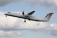 9A-CQA @ EHAM - Departing rw36L - by ghans