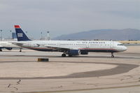 N539UW @ KLAS - USAirways Airbus A321-231, AWE1007 on TWY B1 in sequence for a RWY 25R departure to Charlotte-Douglas International/KCLT. - by Mark Kalfas