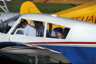 C-FWVE @ CYPK - Air Cadets ready for their first flight.  You couldn't have wiped the smiles off their faces.  It brought back memories of when I was a Cadet and went through the same thing in a DC3. - by Guy Pambrun