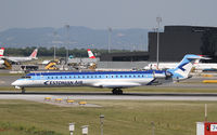 ES-ACC @ LOWW - Estonian Air Canadair CRJ-900 - by Thomas Ranner