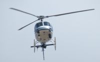 N50NT @ ONT - With permission, heading south crossing both active runways - by Helicopterfriend