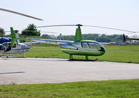 G-ROYM @ EGTB - Robinson R44 Raven II at Wycombe Air Park. - by moxy