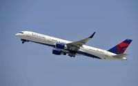 N704X @ KLAX - Departing LAX on 25R - by Todd Royer