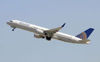 N596UA @ KLAX - Departing LAX on 25R - by Todd Royer
