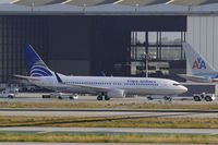 HP-1538CMP @ KLAX - Getting a tow - by Todd Royer