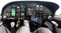 N536DC @ 4R1 - Cockpit panorama view showing synthetic vision on Aspen PFD1000, T-CAS on Aspen PFD 1000, and ATC radar on Garmin 430W GPS with weather and terrain, and backup Garmin 496 with weather and terrain. - by Mike Arlow