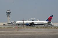 N612DL @ KLAX - Rollout 25L - by Nick Taylor