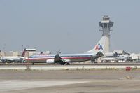 N943AN @ KLAX - Rollout 25L - by Nick Taylor