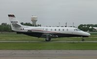 N566F @ KAXN - Cessna 560XL Citation Excel taxiing to the ramp.