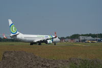 PH-GGZ @ EHGG - The Transavia Boeing is leaving the runway 05 by the taxiway A, to taxi to the apron.