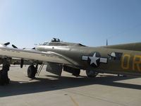 N93012 @ CMA - 1944 Boeing B-17G FLYING FORTRESS 'Nine O Nine', four turbocharged Wright Cyclone R-1820-97 1,200 hp each, dorsal guns turret, ventral guns turret, waist gun turret, bomb bay doors open - by Doug Robertson