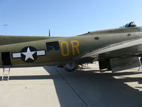 N93012 @ CMA - 1944 Boeing B-17G FLYING FORTRESS 'Nine O Nine', waist gun, ventral turret and dorsal turret. Bomb bay doors open. -17G model carries 13 machine guns, up to 17,600 lb bomb load - by Doug Robertson