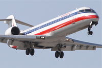 N511AE @ ORD - American Eagle Bombardier CL-600-2C10, EGF3732 arriving from MSP, RWY14R ORD. - by Mark Kalfas