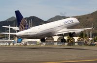 N413UA @ TNCM - N413UA
