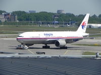 9M-MRI @ EHAM - Malaysia at Schiphol Airport - by Henk Geerlings