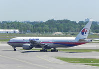 9M-MRI @ EHAM - Schiphol Airport - by Henk Geerlings