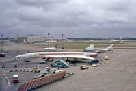 G-BSST @ EGLL - Concorde prototype 002 at London Heathrow on its return from a Far East sales tour. In front of the forward door are the flags of the nations visited. Also seen are two 707's, two Tridents, a 747, a Caravelle and a 727. - by Malcolm Clarke