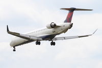 N926XJ @ ORD - Pinnacle Airlines/Delta Connection Bombardier CL600-2D24, FLG3561 arriving from KMEM, RWY 28 approach KORD. - by Mark Kalfas