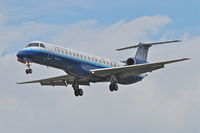 N12569 @ KORD - ExpressJet/United Express Embraer EMB-145LR, ASQ5973 on final for RWY 28 at Chicago's O'Hare, arriving from Lexington, Kentucky - Blue Grass/KLEX. - by Mark Kalfas