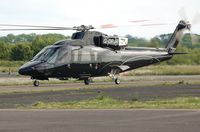 G-DPJR @ EGFH - Visiting S-76B helicopter taxying to the apron. - by Roger Winser