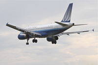 N810UA @ KORD - United Airlines Airbus A319-131, UAL353 arriving from Dallas-Fort Worth, RWY 28 approach KORD. - by Mark Kalfas