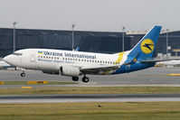 UR-GAU @ LOWW - Shortly before touching down on Rwy 16