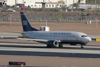 N154AW @ PHX - Taken at Phoenix Sky Harbor Airport, in March 2011 whilst on an Aeroprint Aviation tour - by Steve Staunton