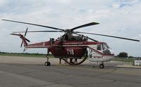 N718HT @ KAXN - Sikorsky CH-54 Skycrane at the fuel pumps. Largest helicopter I've ever seen in Alexandria. - by Kreg Anderson
