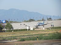 N2128Q @ POC - Over the numbers waiting to touch down - by Helicopterfriend