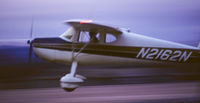 N2162N @ WHP - 62N lands at Whiteman Airpark (WHP) in February of 1971 piloted by Steve Palmer.  His father owned the plane at this time and it was hangared at Torrance Airport in the Los Angeles area. - by Roland Penttila