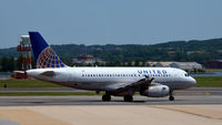 N844UA @ KDCA - Taxi DCA, VA - by Ronald Barker