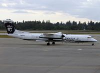 N442QX @ KSEA - Lots of Q400s at SEA