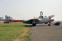 G-VTII @ EGTC - De Havilland DH-115 Vampire T.11 being 'prepped' for an air show later in the day. Cranfield Airport 1990. - by Malcolm Clarke