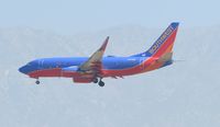 N773SA @ ONT - Approaching the outer fence - by Helicopterfriend