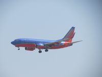 N427WN @ ONT - On final for 26R - by Helicopterfriend